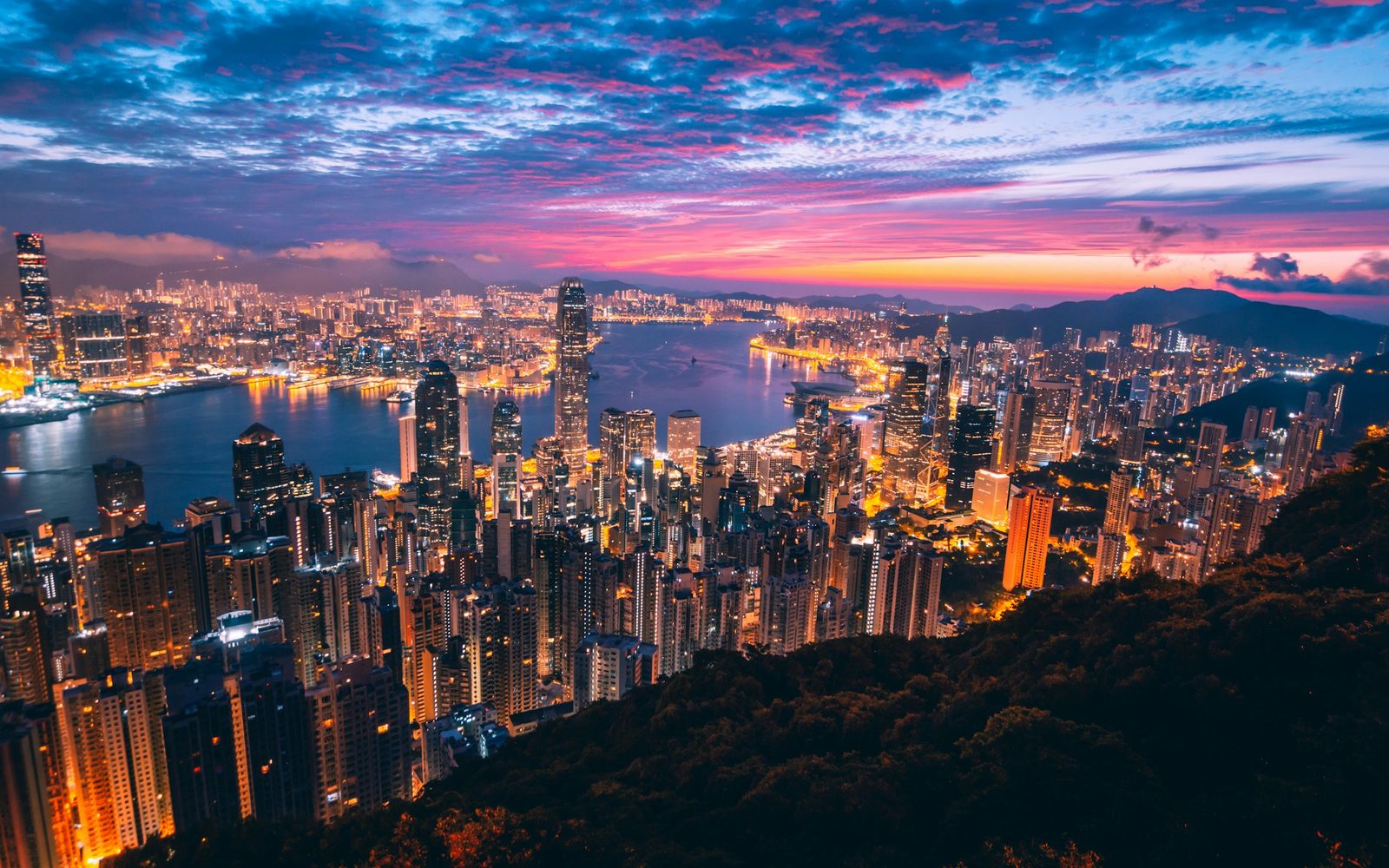 Dawn over Victoria Harbour, Hong Kong — the city's access to frontier AI is opening up through legitimate cloud routes